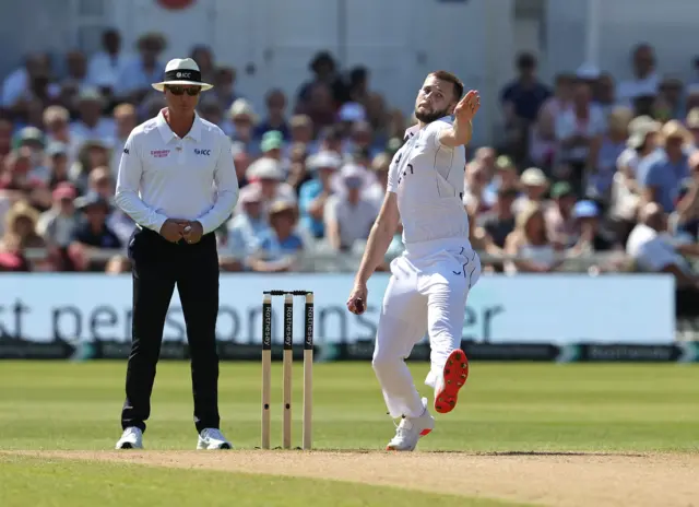 Gus Atkinson bowls