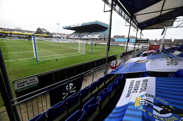 Bristol Rover's stadium with the club's flag laid across seats