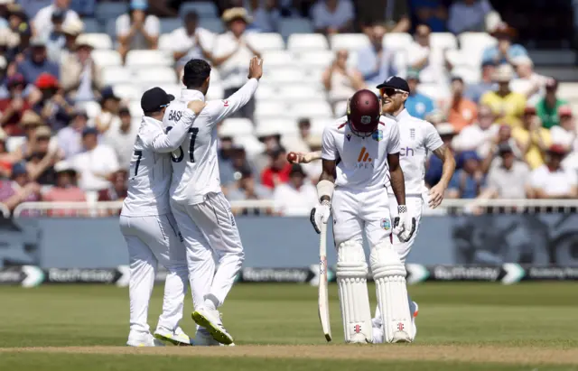 England's Shoaib Bashir celebrates taking the wicket of West Indies' Kirk McKenzie during day two of the Second Rothesay Test match at Trent Bridge, Nottingham