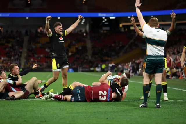 Kieran Hardy scores a try for Wales