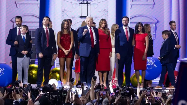 Donald Trump on stage with members of his family and other allies