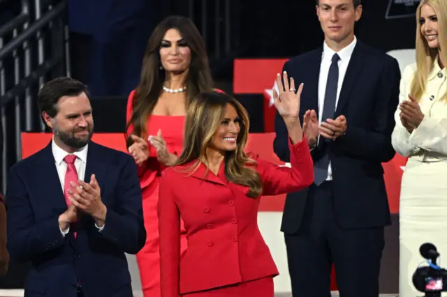 Melania Trump waves at the crowd