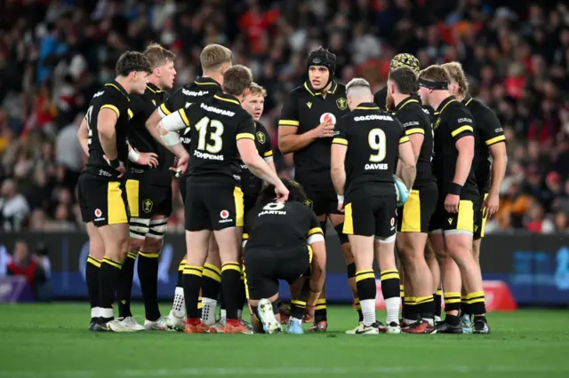 Wales players in a huddle