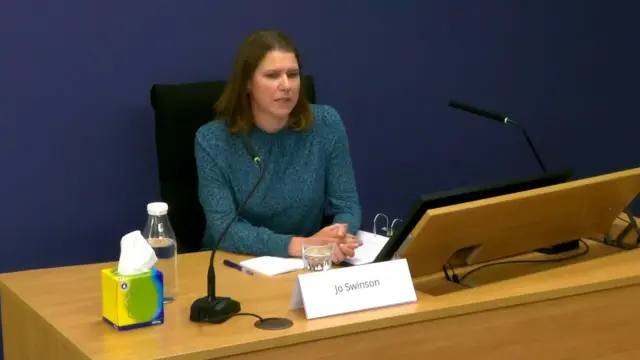 Jo Swinson sitting down at the inquiry