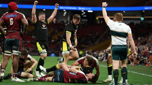 Wales celebrate their winning try