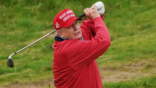 Trump playing golf