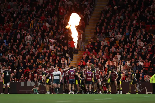 Queensland Reds push over for a try against Wales