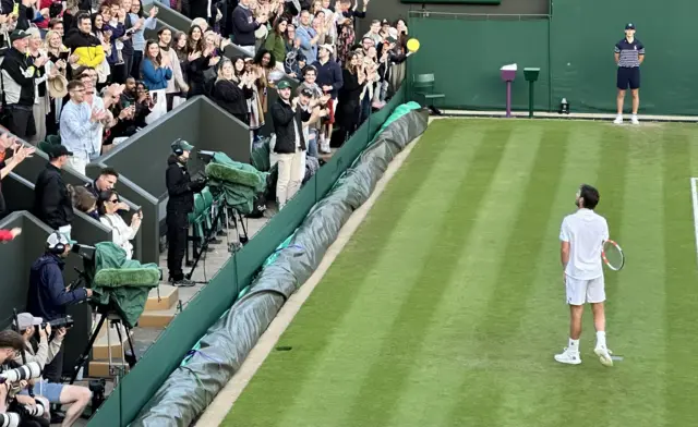 Cam Norrie with fans