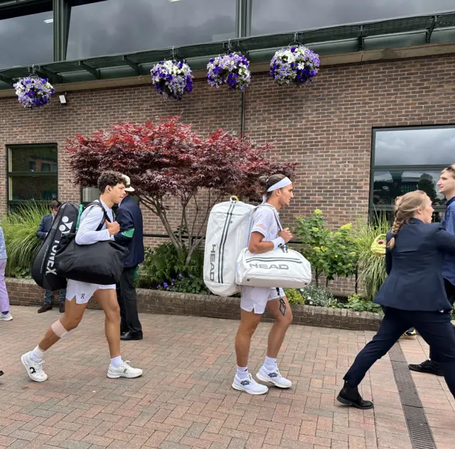 Players walking to court 18