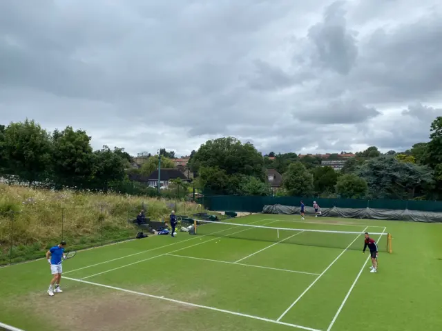 Andy Murray practising with Jamie Murray