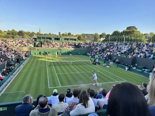 Cam Norrie fist pumps