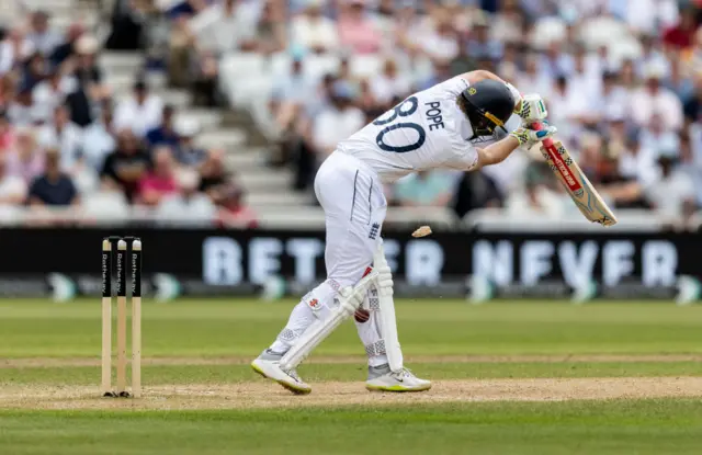 Ollie Pope's bat breaks during the second Test at Trent Bridge