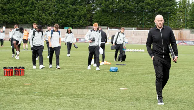 Hibernian head coach and his players at New Central Park