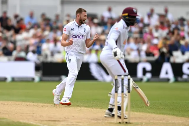 Gus Atkinson celebrates the wicket of Kevin Sinclair