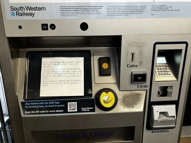 South Western Railways ticket machine with a hand-written sign on it