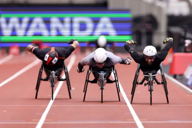 Brent Lakatos of Canada, Nathan Maguire of Great Britain and David Weir