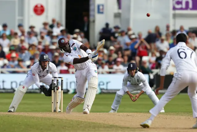 Shoaib Bashir is hit for four by Jason Holder