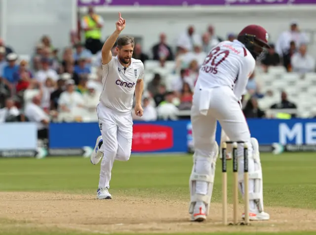 Chris Woakes celebrates the wicket of Mikyle Louis