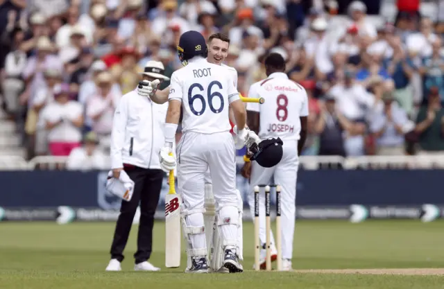 Harry Brook celebrates his century with Joe Root