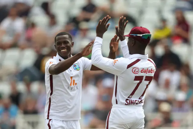 Shamar Joseph celebrates the wicket of Chris Woakes