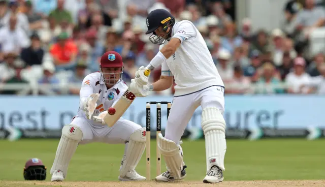 Joe Root plays a shot