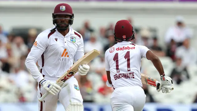 Mikyle Louis (L) and of the West Indies Kraigg Brathwaite take a run during day four of the 2nd Test Match between England and the West Indies at Trent Bridge