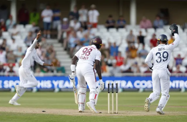 West Indies’ Jason Holder (centre) is bowled by England’s Shoaib Bashir (left) during day four of the Second Rothesay Test match at Trent Bridge, Nottingham