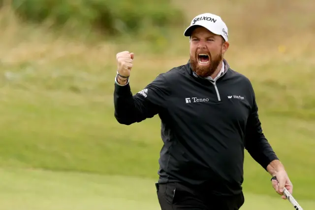 Shane Lowry roars with a clenched fist