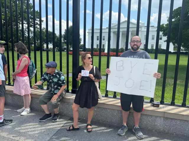 People holding placards at the White House