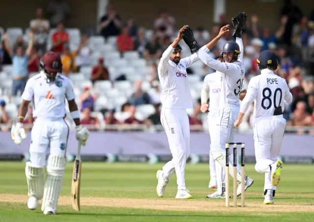 Shoaib Bashir celebrates the wicket of Kavem Hodge