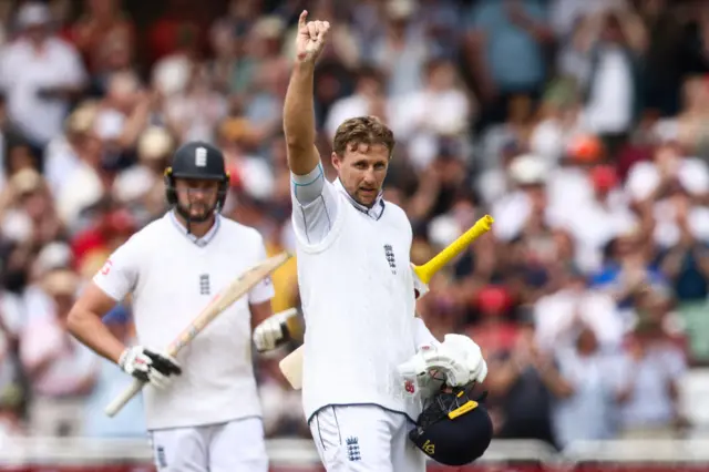 Joe Root celebrates his century against West Indies