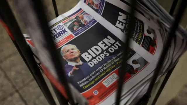 Copies of newspapers are displayed, with the headline: 'Biden drops out'