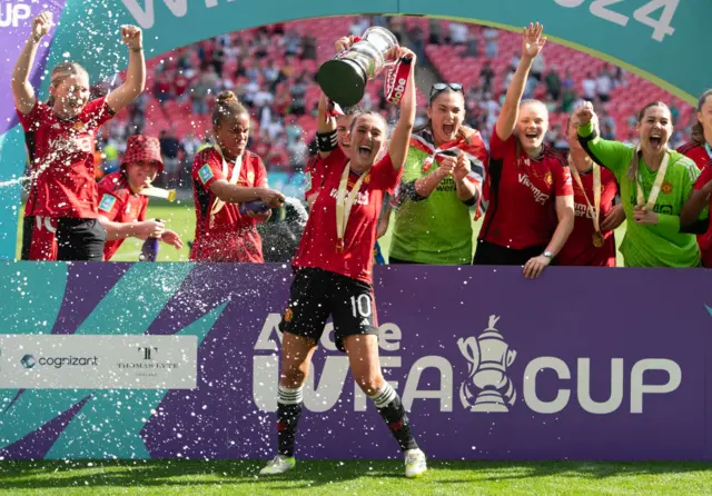 Katie Zelem of Manchester United Women and her team mates celebrate winning the FA Cup