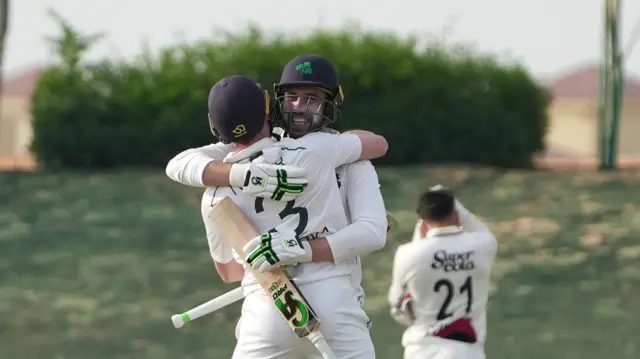 Lorcan Tucker and Andrew Balbirnie celebrate the victory in Abu Dhabi