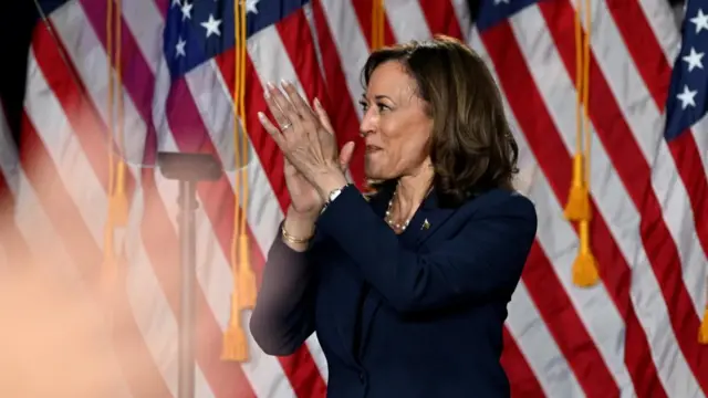 U.S. Vice President Kamala Harris applauds during a campaign event at West Allis Central High School, in West Allis, Wisconsin, U.S., July 23, 2024