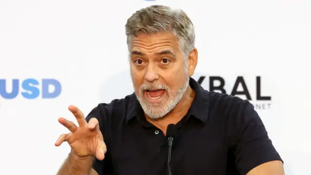 Actor George Clooney speaks at an event for the second year of the Roybal School of Film and Television Production Magnet