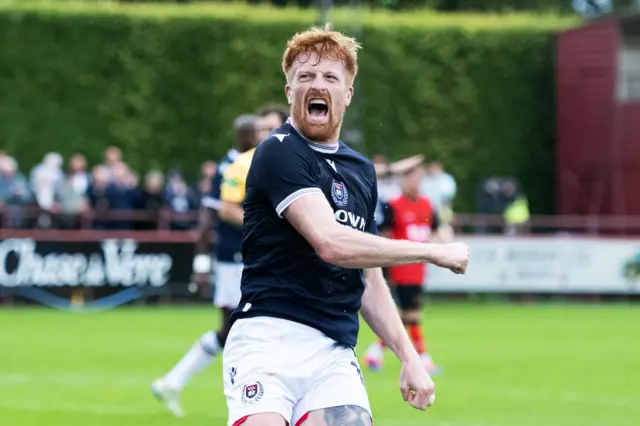 Simon Murray celebrates