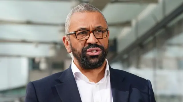 Home Secretary James Cleverly speaking to the media outside BBC Broadcasting House in London