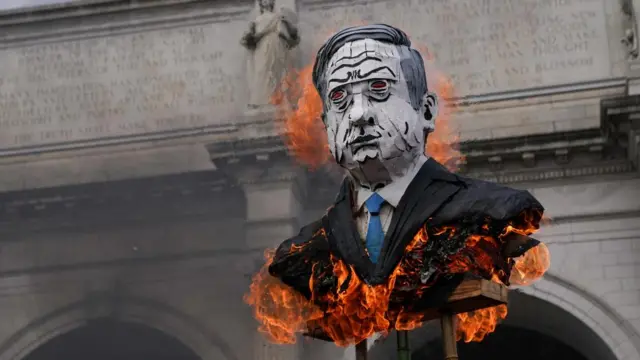 A burning effigy of Benjamin Netanyahu