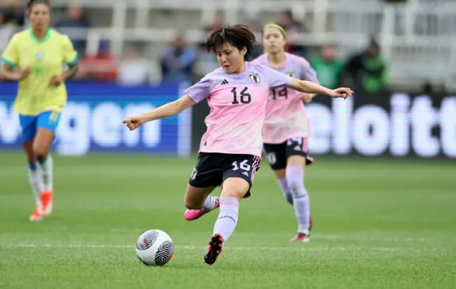 Honoka Hayashi striking a ball for Japan