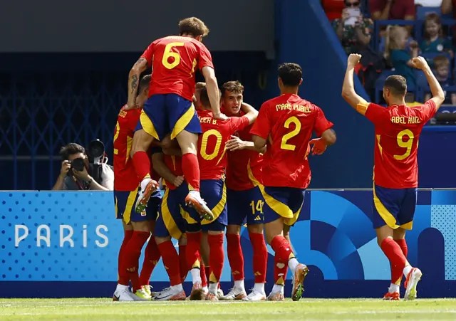 Spain celebrate scoring a goal