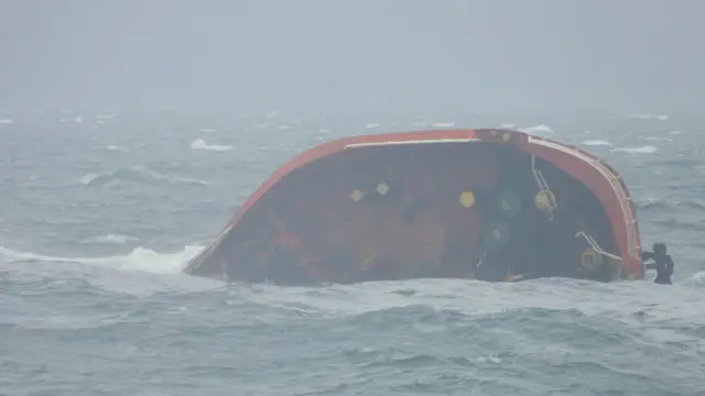 A handout picture made available by the Philippine Coast Guard (PCG) shows oil tanker MT Terra Nova drifting on sea waters off Manila Bay, Philippines