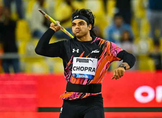 Neeraj Chopra prepares to throw a javelin