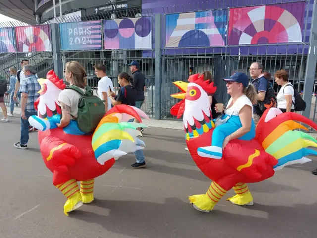 French fans dressed as cockerels