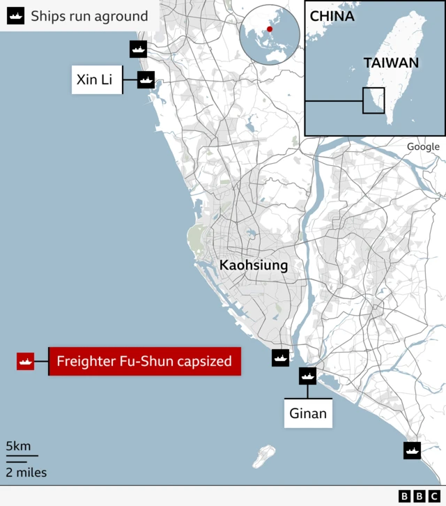 Map titled Ships run aground which shows coastline of Taiwan with Kaohsiung named. Five ship icons show the location of where they are grounded. One red icon shows a ship which capsized about 16 nautical miles off the coast. Two of the ships icons are named XIn Li and Ginan