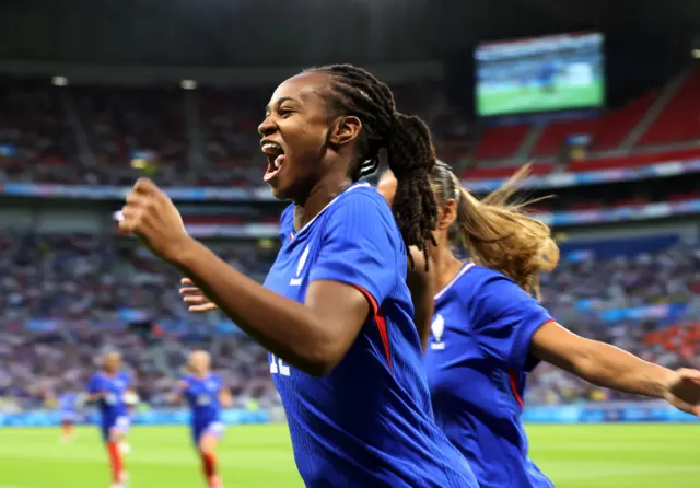 Marie-Antoinette Katoto celebrates scoring a goal