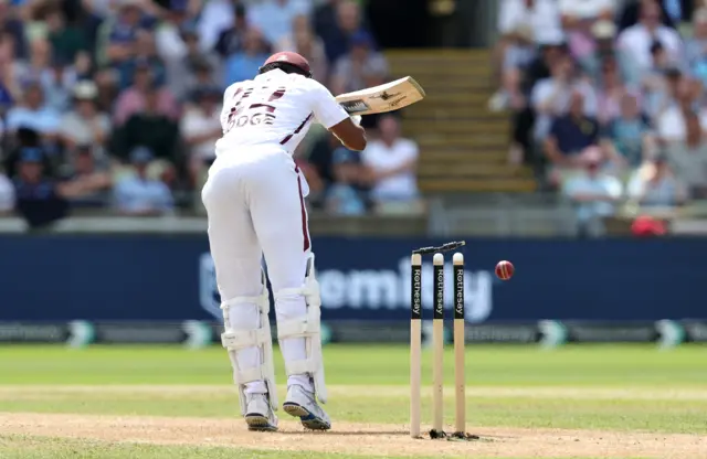 Kavem Hodge is bowled by Chris Woakes