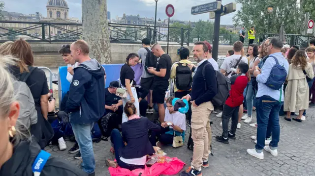 Spectators having a picnic