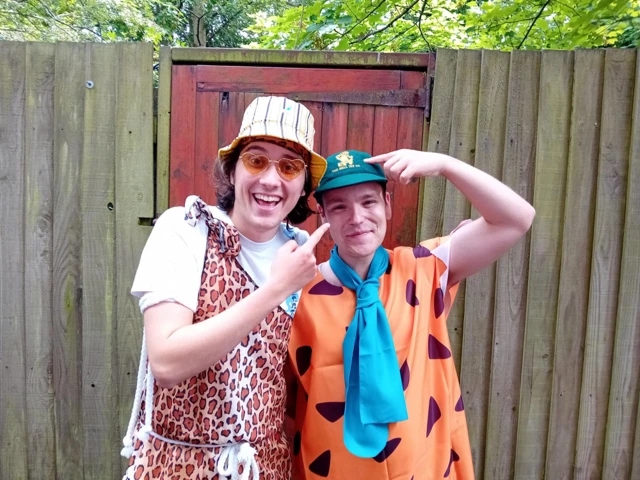 Cricket fans Oscar and Stan dressed up as characters from the Flintstones