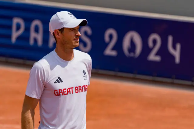 Andy Murray looks on